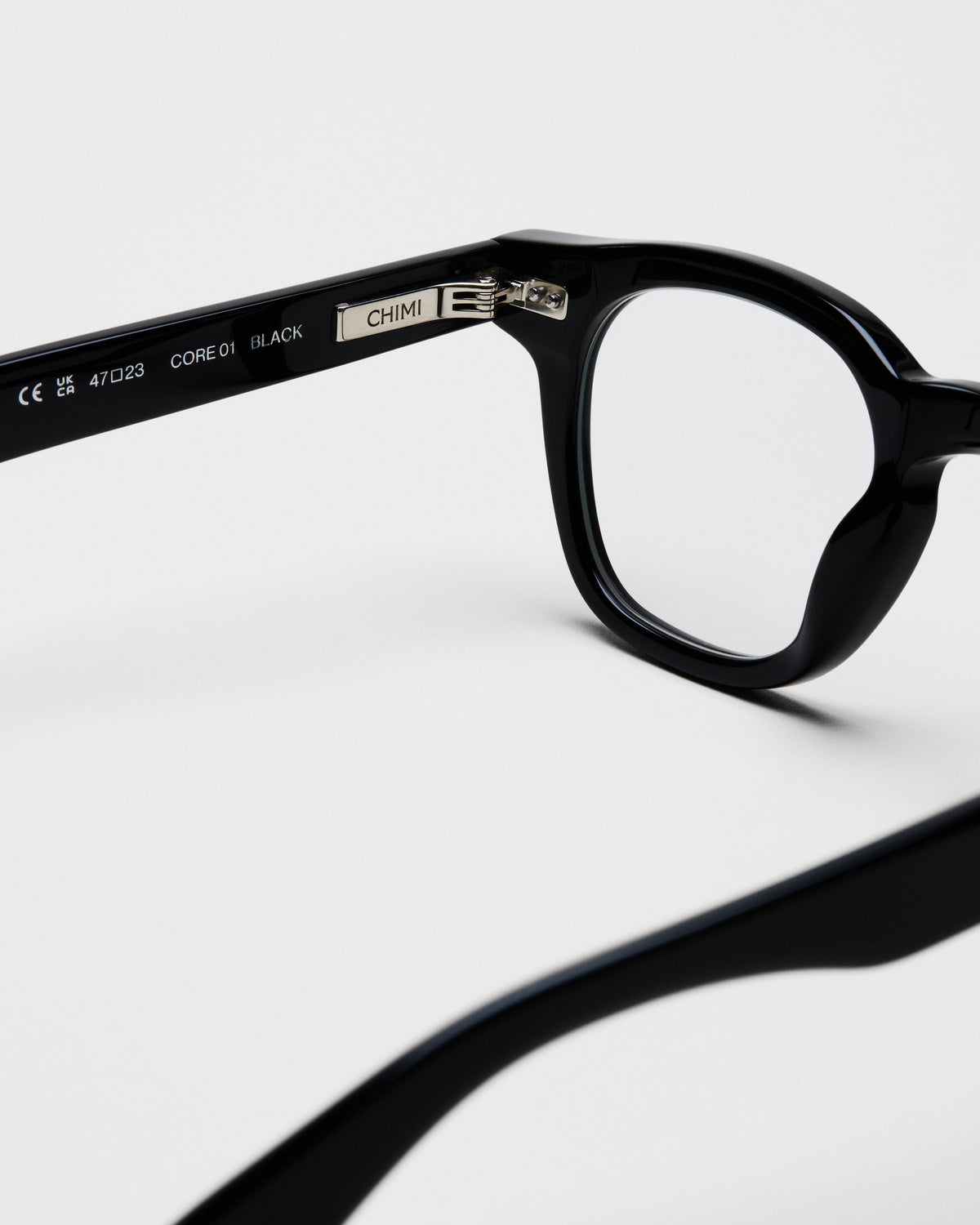Close-up of the frame and hinge details on CHIMI 01 Core Black Clear Eyeglasses
