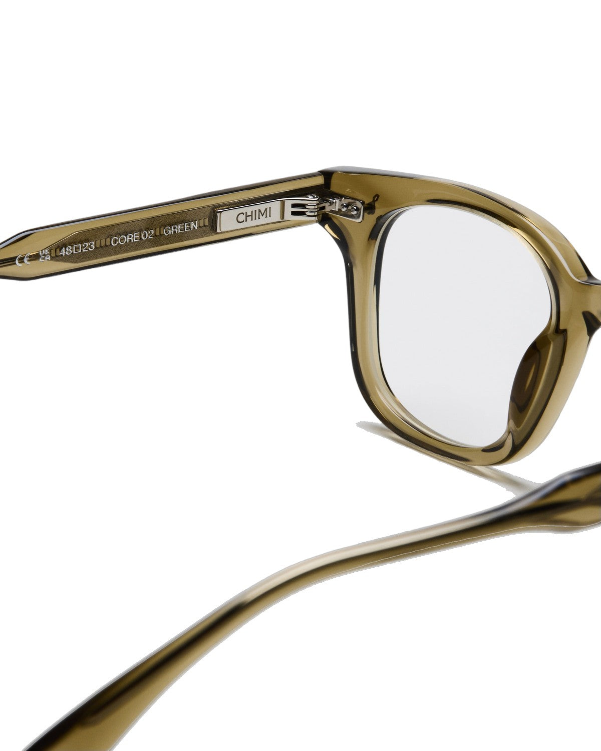 Close-up of the temple hinge and branding on CHIMI 02 Core Green Clear eyeglasses.