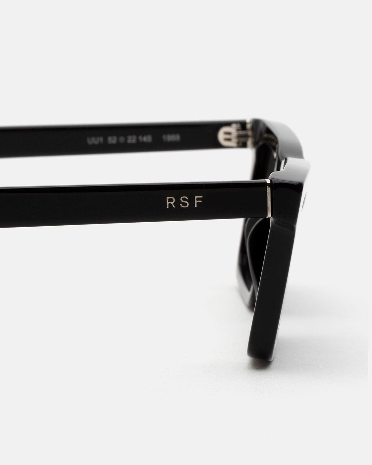 Detail of the RSF branding on the temple of RETROSUPERFUTURE 1968 Black sunglasses.