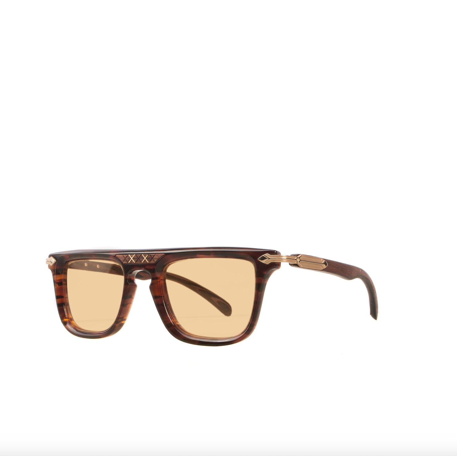 Sunglasses with tortoiseshell frame and amber lenses on a white background