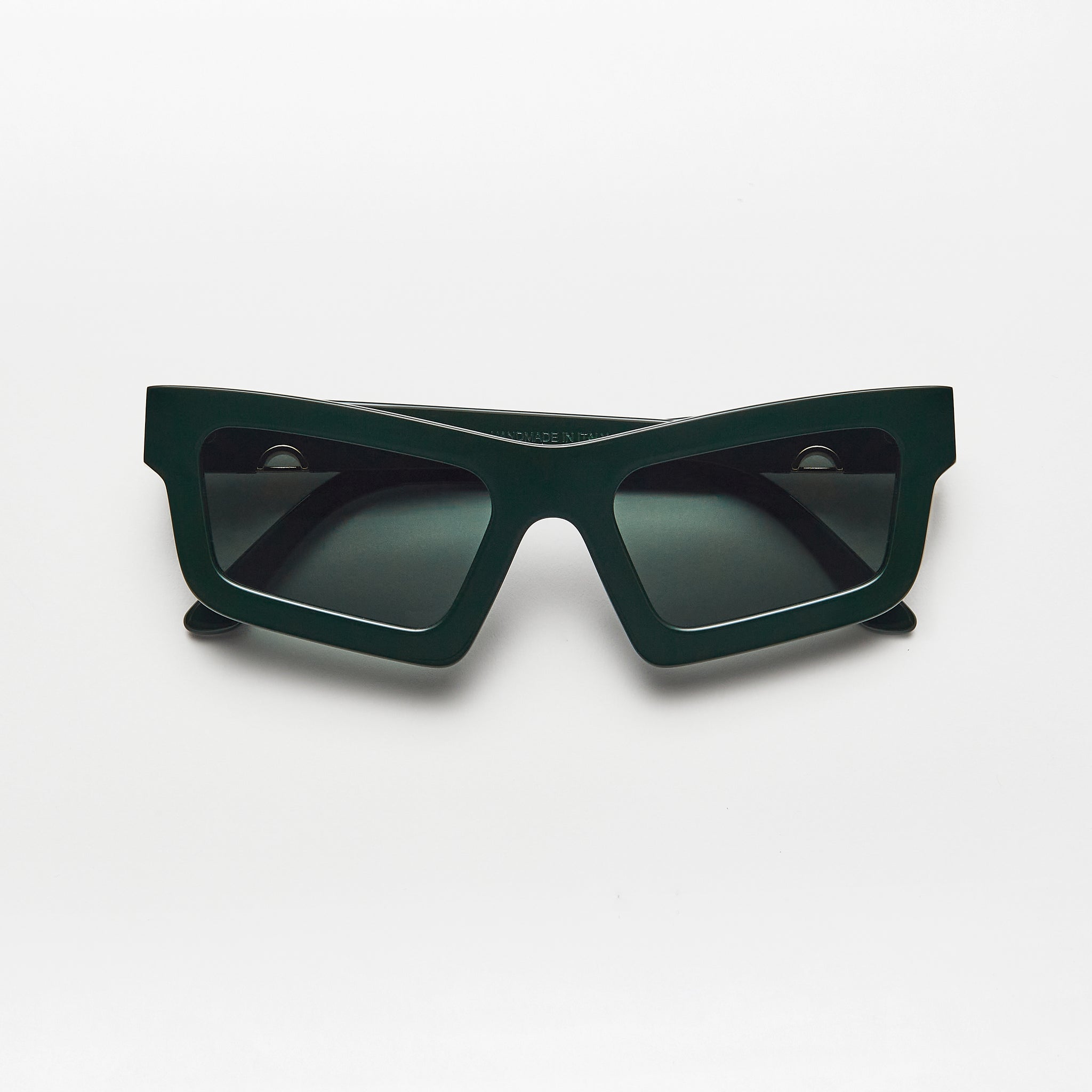 Tilde . Green