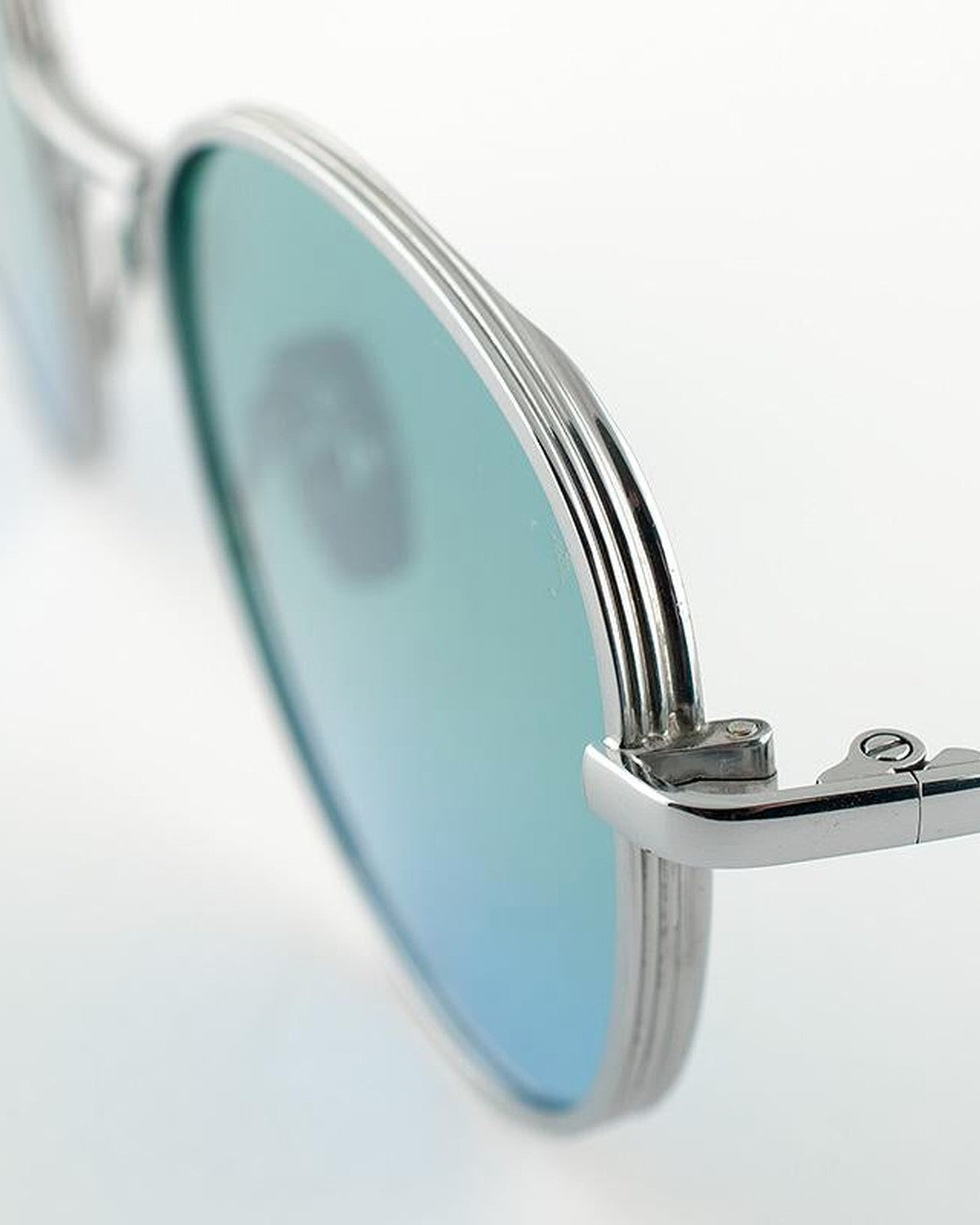 Close-up of the hinge and temple detail on EYEPETIZER ALEN C.1-43F sunglasses.