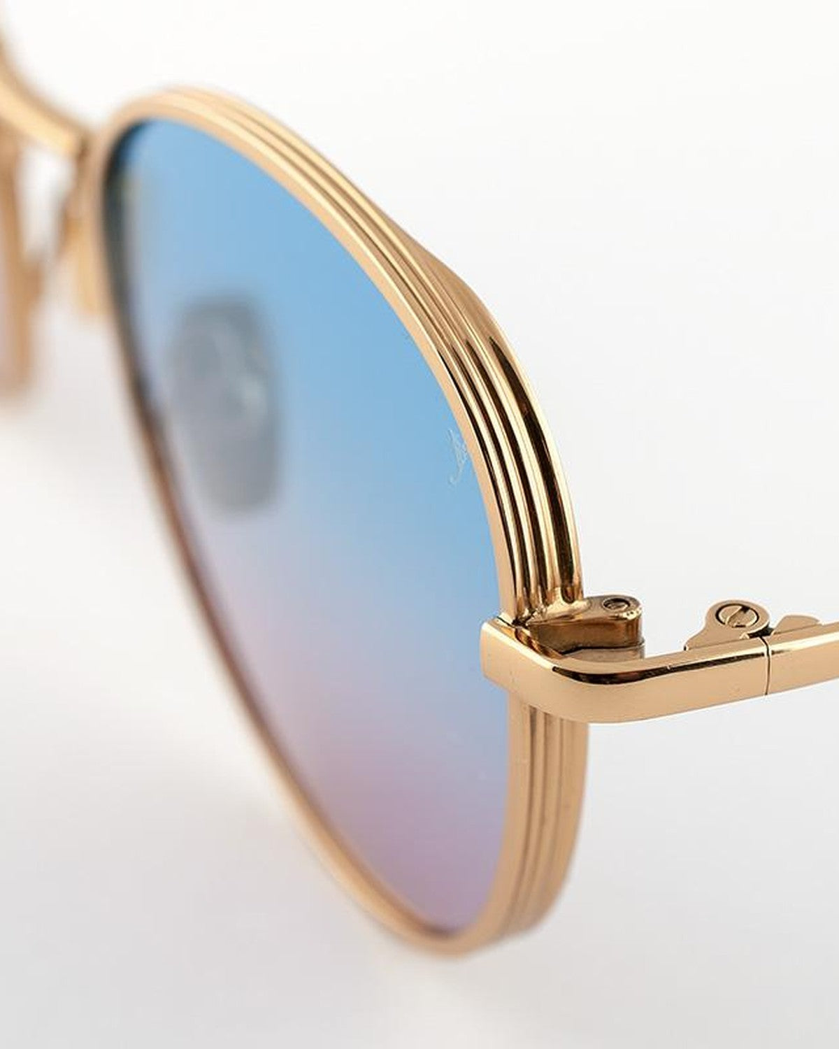Detail of the layered metal construction and hinge on EYEPETIZER ALEN C.4-42F sunglasses.