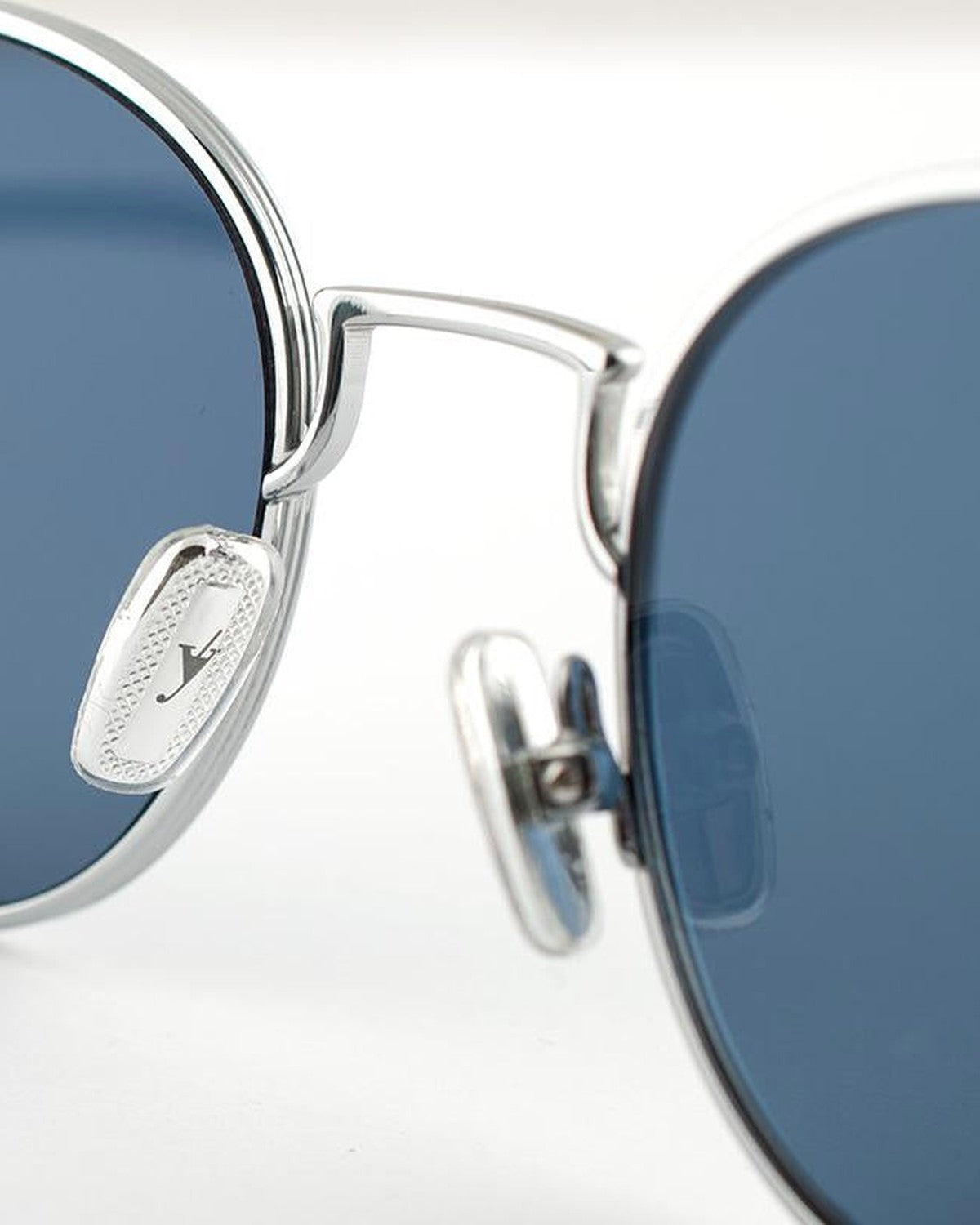 Detail of the nose bridge and engraved brand logo on EYEPETIZER ALEN C.1-39 sunglasses.