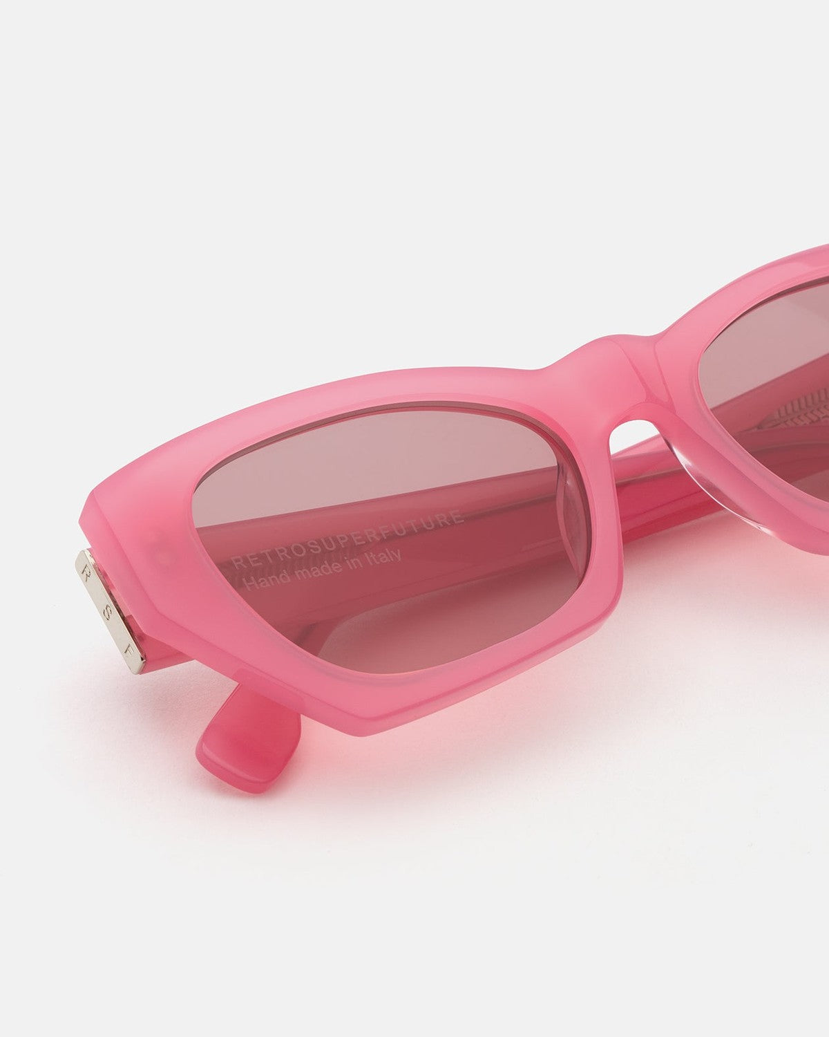 Close-up of the temple hinge on RETROSUPERFUTURE Amata Estate Fragola sunglasses.