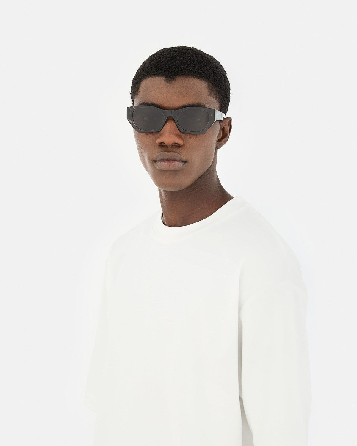 Model wearing RETROSUPERFUTURE Amata Estate Liquirizia sunglasses, front view.