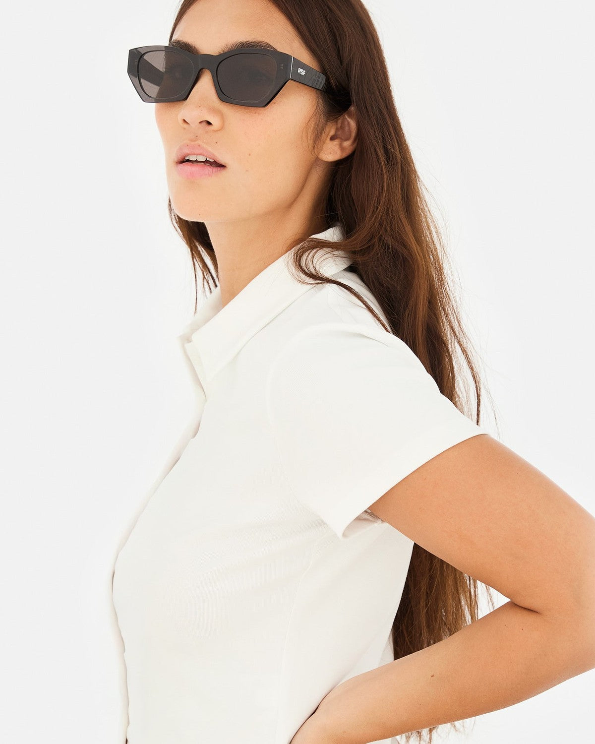 Model wearing RETROSUPERFUTURE Amata Estate Liquirizia sunglasses, side profile.