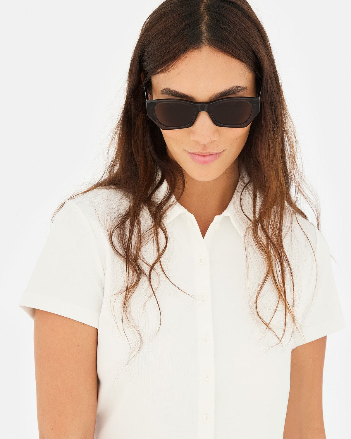Model wearing RETROSUPERFUTURE Amata Estate Liquirizia sunglasses, front portrait.