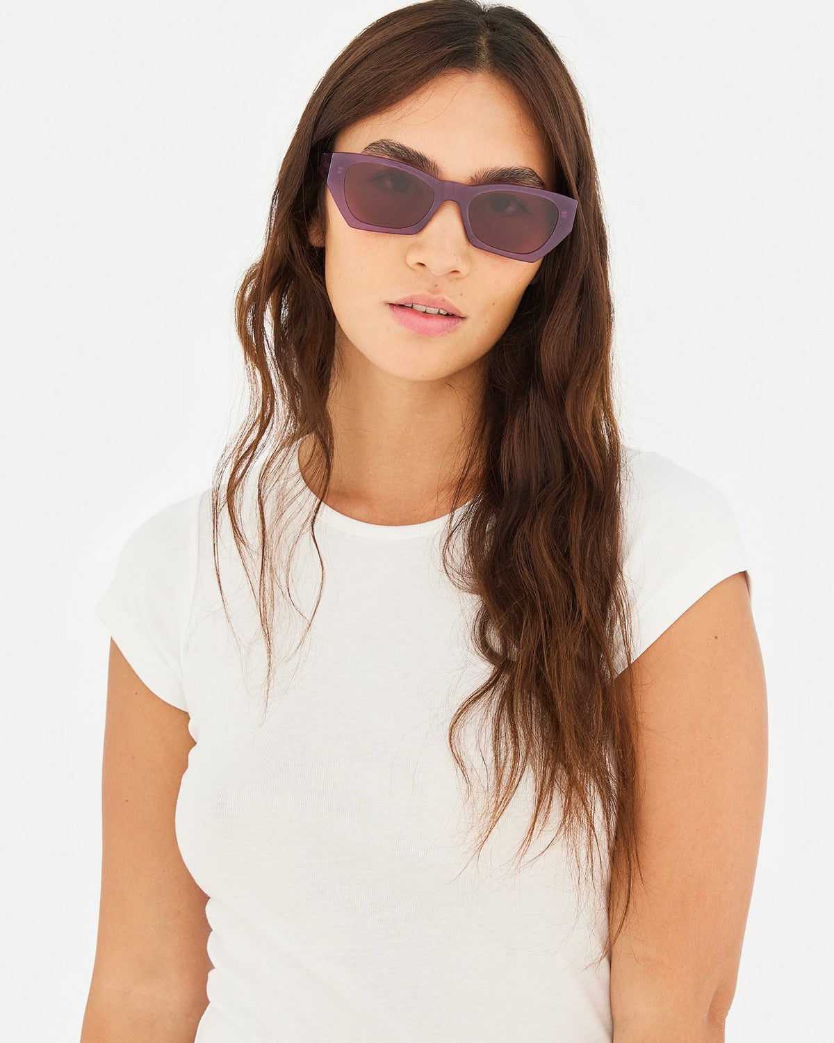 Model wearing RETROSUPERFUTURE Amata Estate Mirtillo sunglasses with white t-shirt.