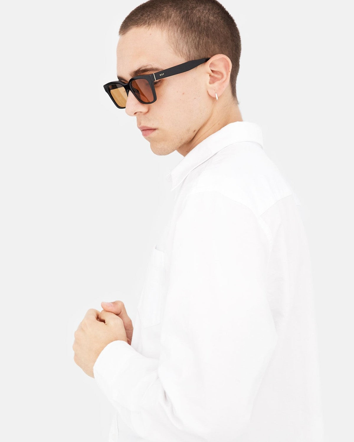 Side profile of RETROSUPERFUTURE America Refined sunglasses on model.