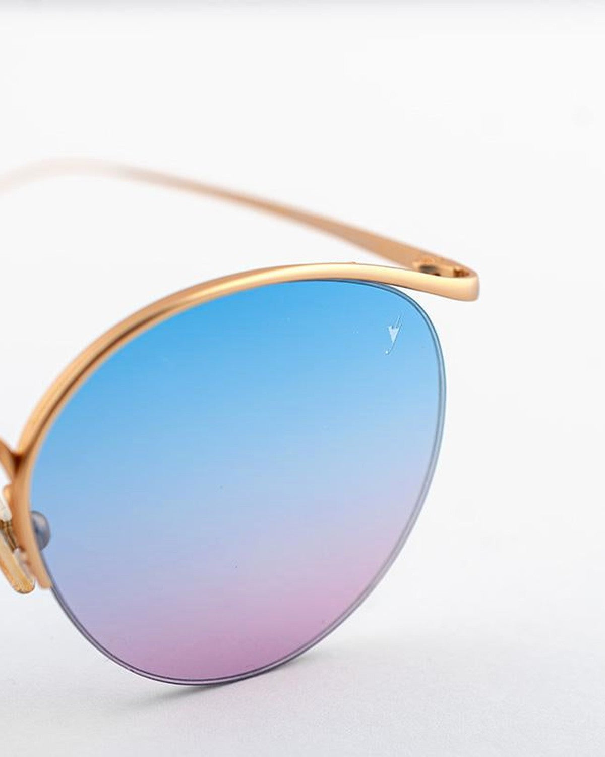 Close-up of the left lens and curved temple on EYEPETIZER AUGUSTO C.4-OP-42F sunglasses.