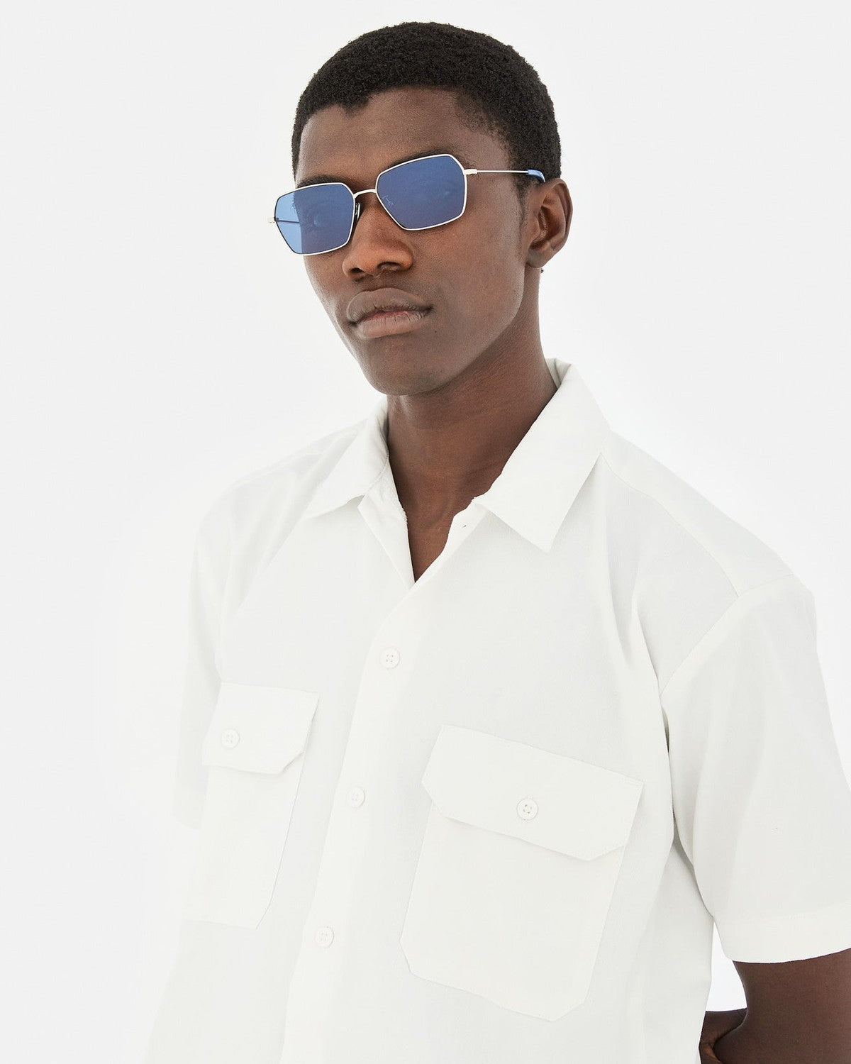 Side profile of model wearing RETROSUPERFUTURE Balarm Bluissimo sunglasses.