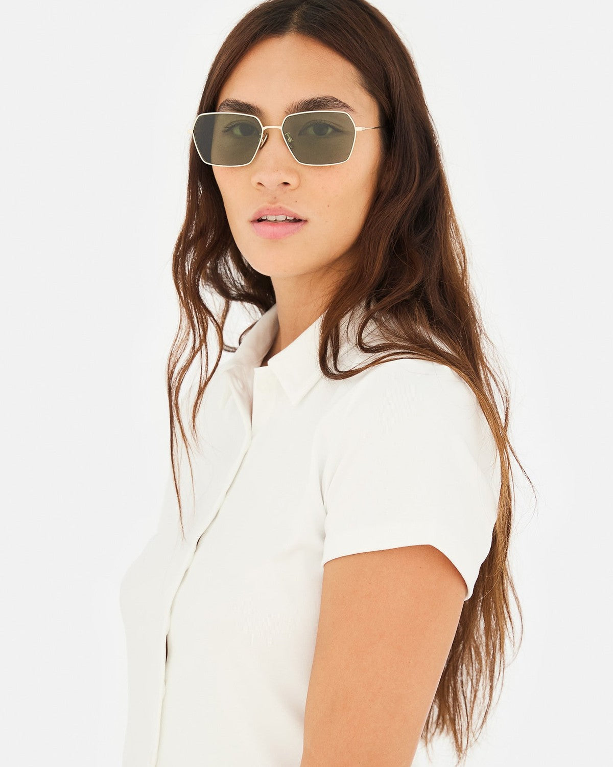 Side profile of model wearing RETROSUPERFUTURE Balarm Classico sunglasses.