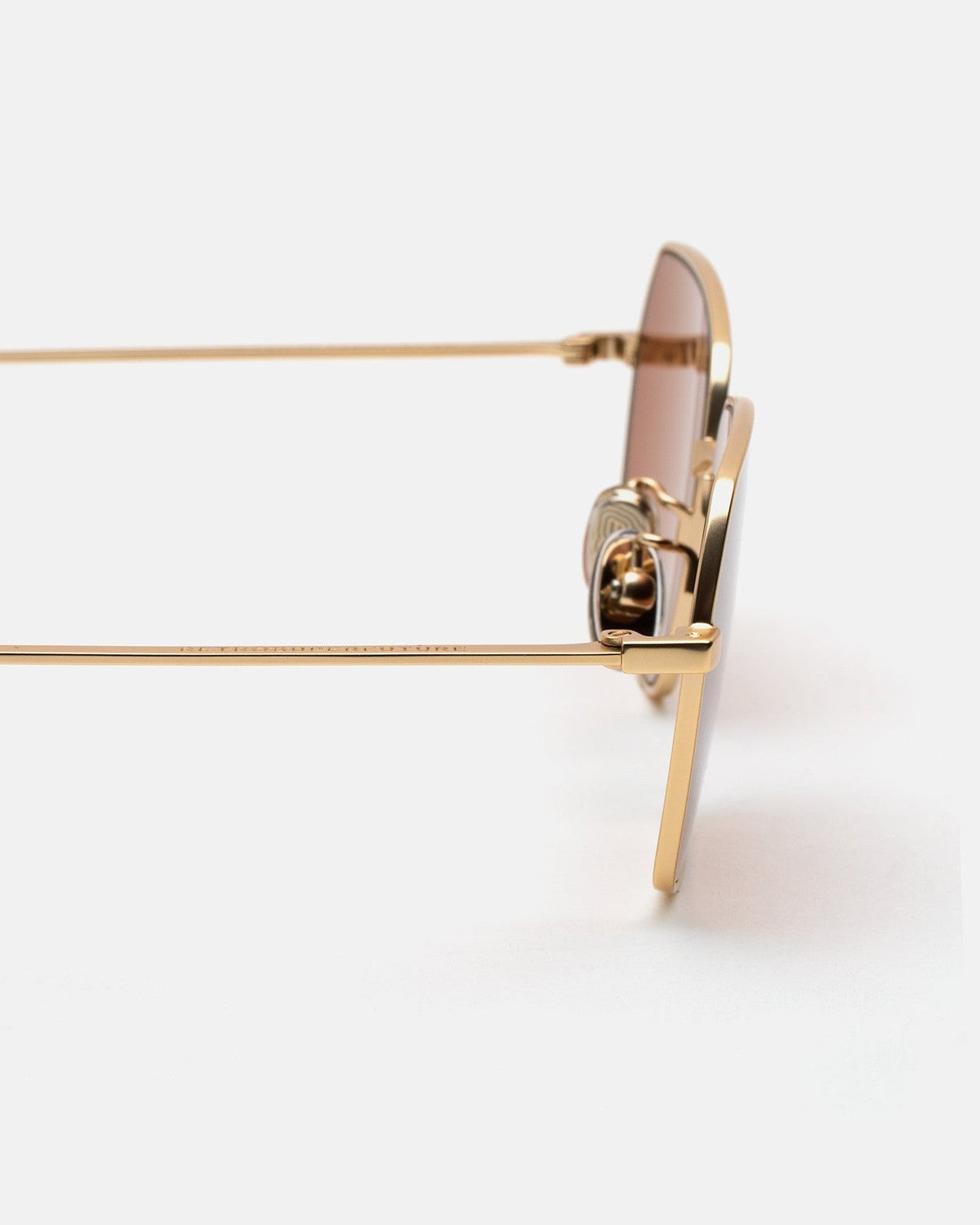 Close-up of the hinge mechanism on RETROSUPERFUTURE Balarm Graffiato sunglasses.