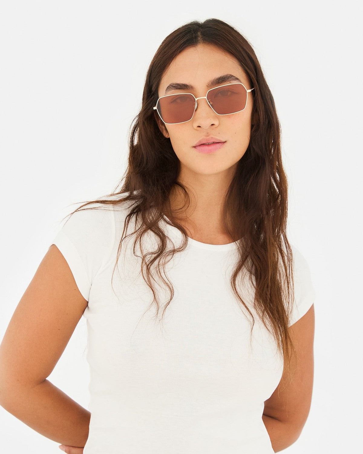 Model wearing RETROSUPERFUTURE Balarm Graffiato sunglasses with white tee.