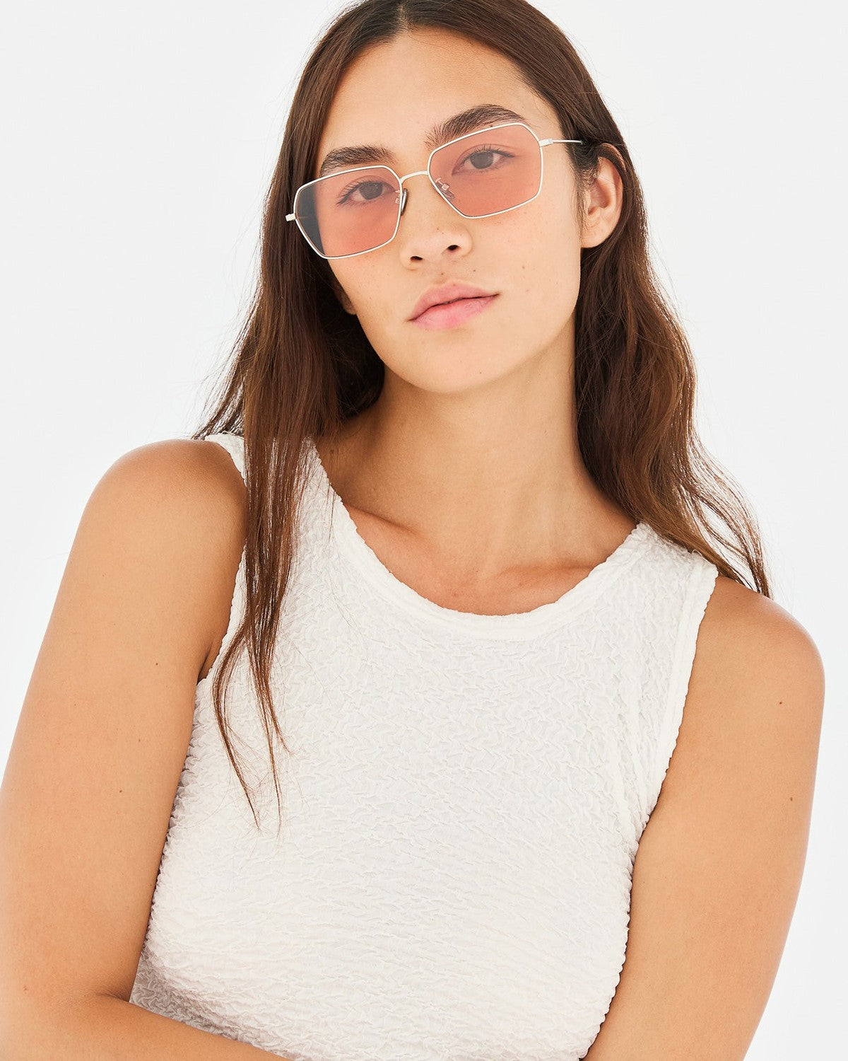 Model wearing RETROSUPERFUTURE Balarm Nebbia Rosa sunglasses.