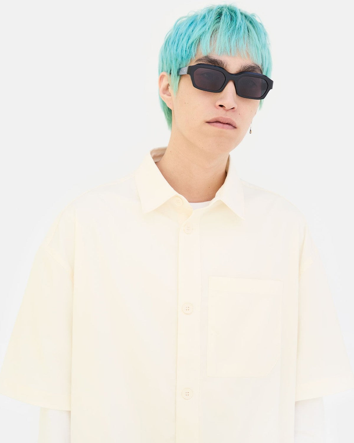 Model wearing RETROSUPERFUTURE Boletus Black sunglasses, front view.