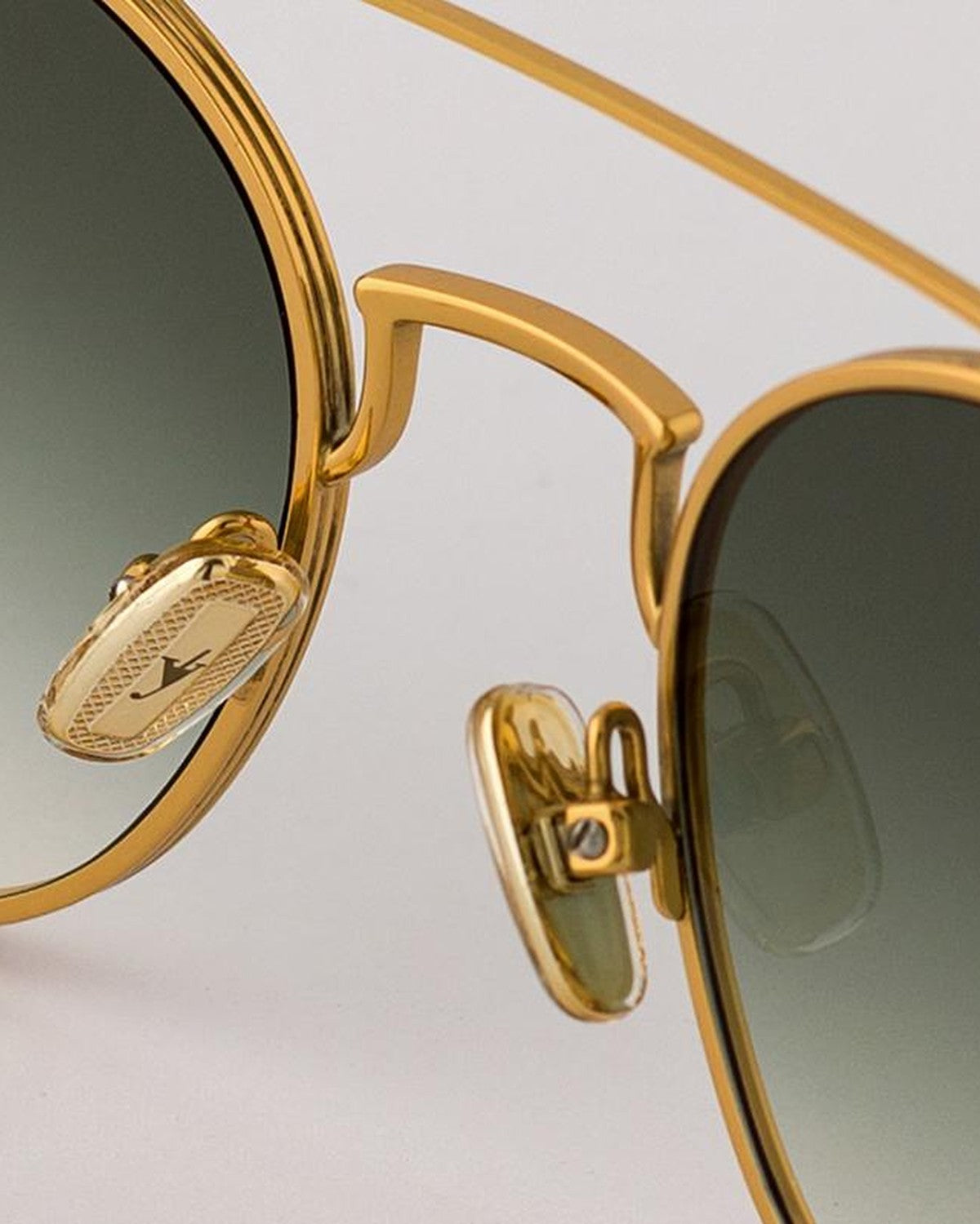 Detail of the bridge and nose pads showing EYEPETIZER branding on BUILD C.4-25 sunglasses.