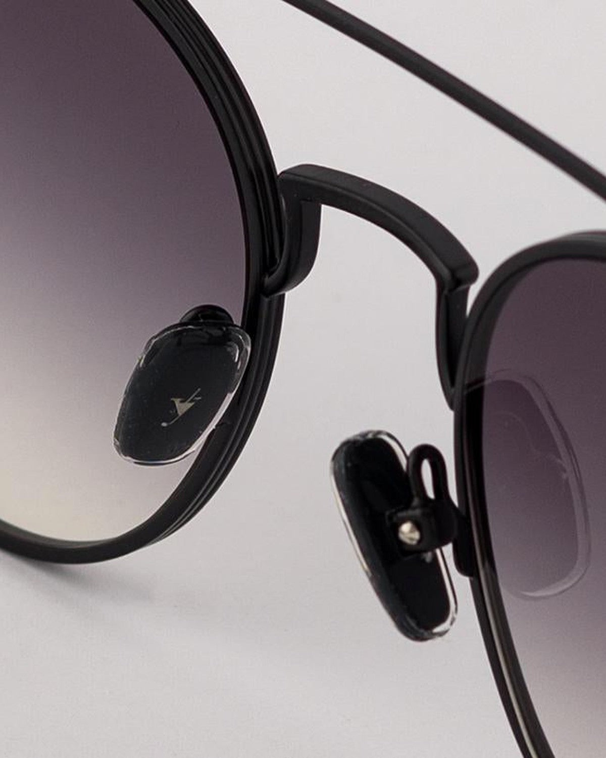 Detail of the nose bridge and temple hinges on EYEPETIZER BUILD C.6-27 sunglasses.