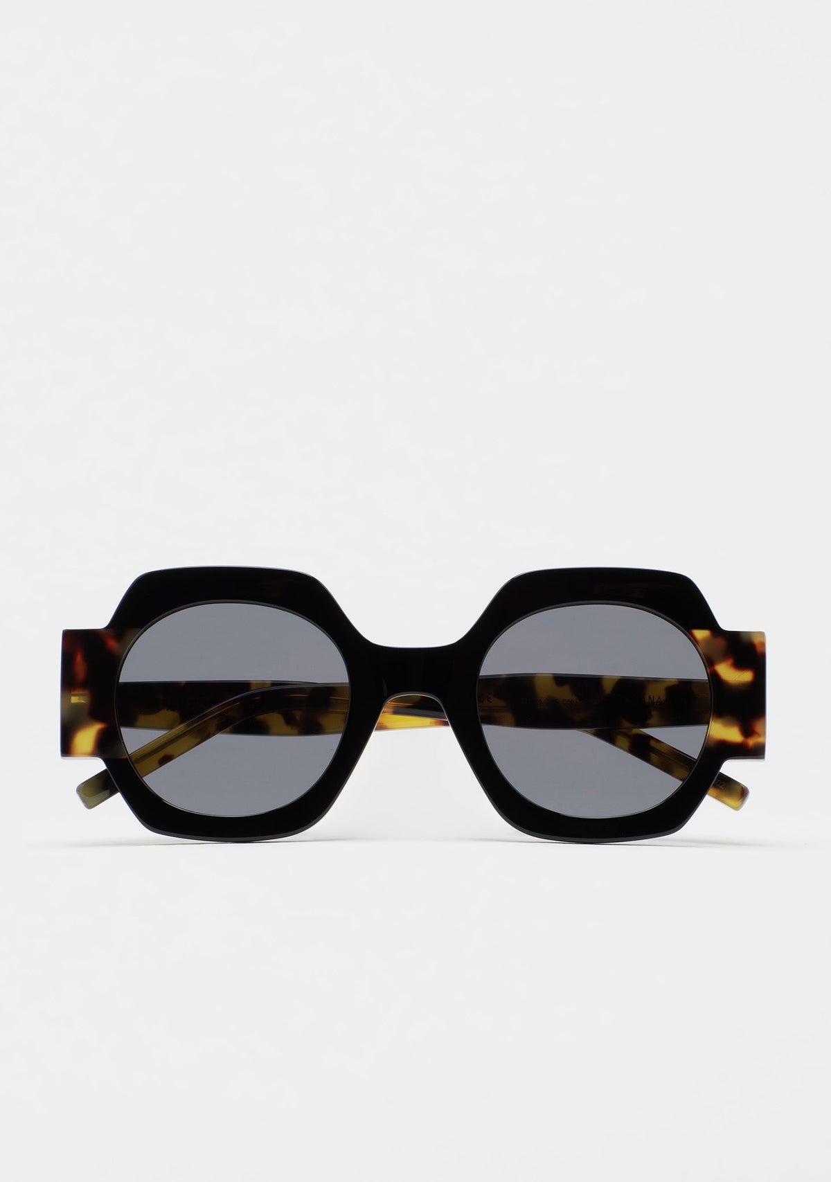 Front view of KALEOS Cabana 01 sunglasses with black geometric frames and tortoiseshell temples.