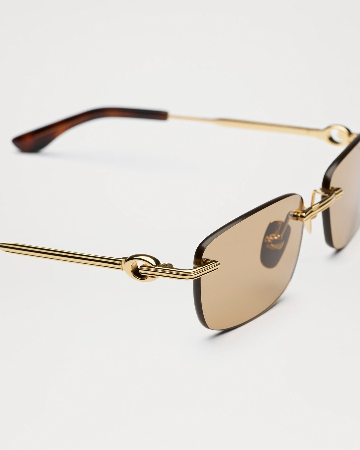 Angle view of CHIMI Cadenza Navigator Brown sunglasses showing the decorative temple detail.