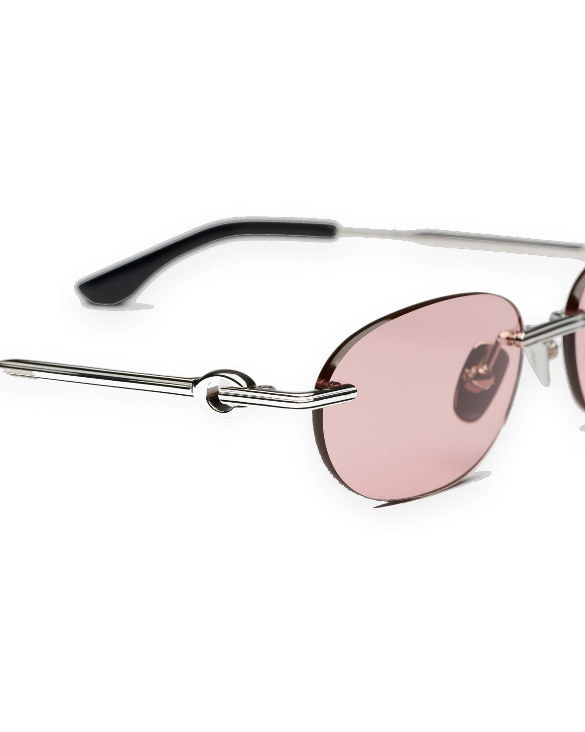 Close-up of the metal bridge and ridged temple detail on CHIMI Cadenza Oval Pink Low sunglasses.
