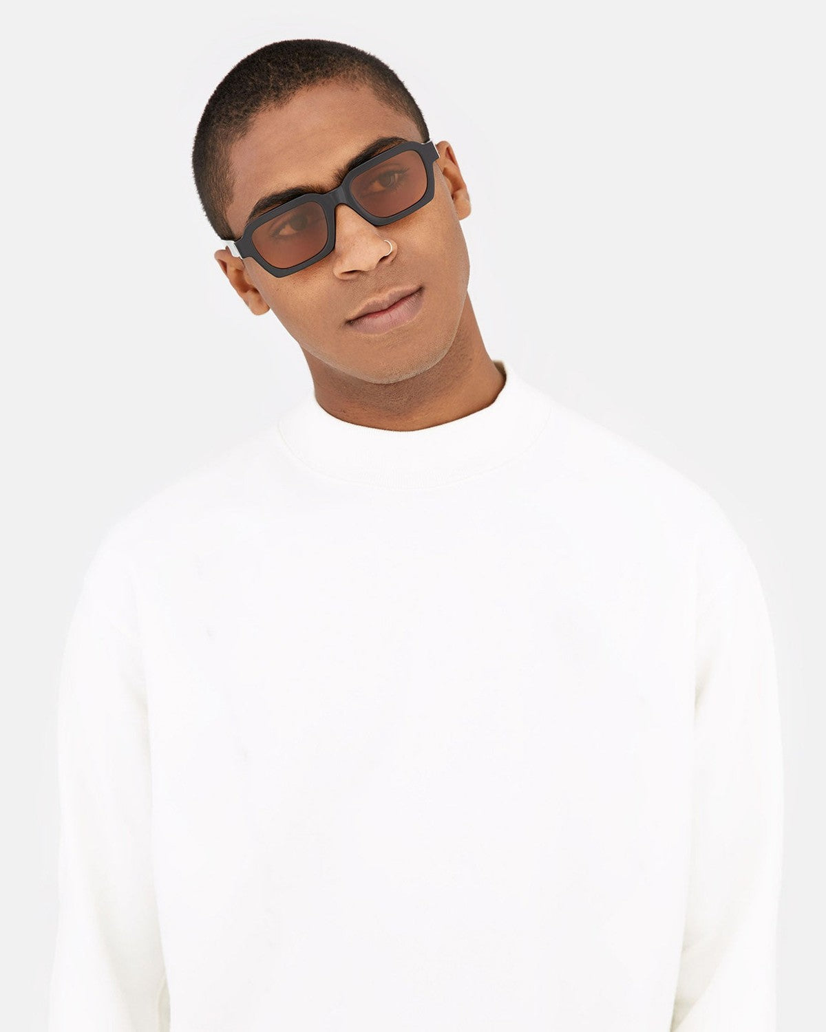 Model wearing RETROSUPERFUTURE Caro Refined sunglasses.