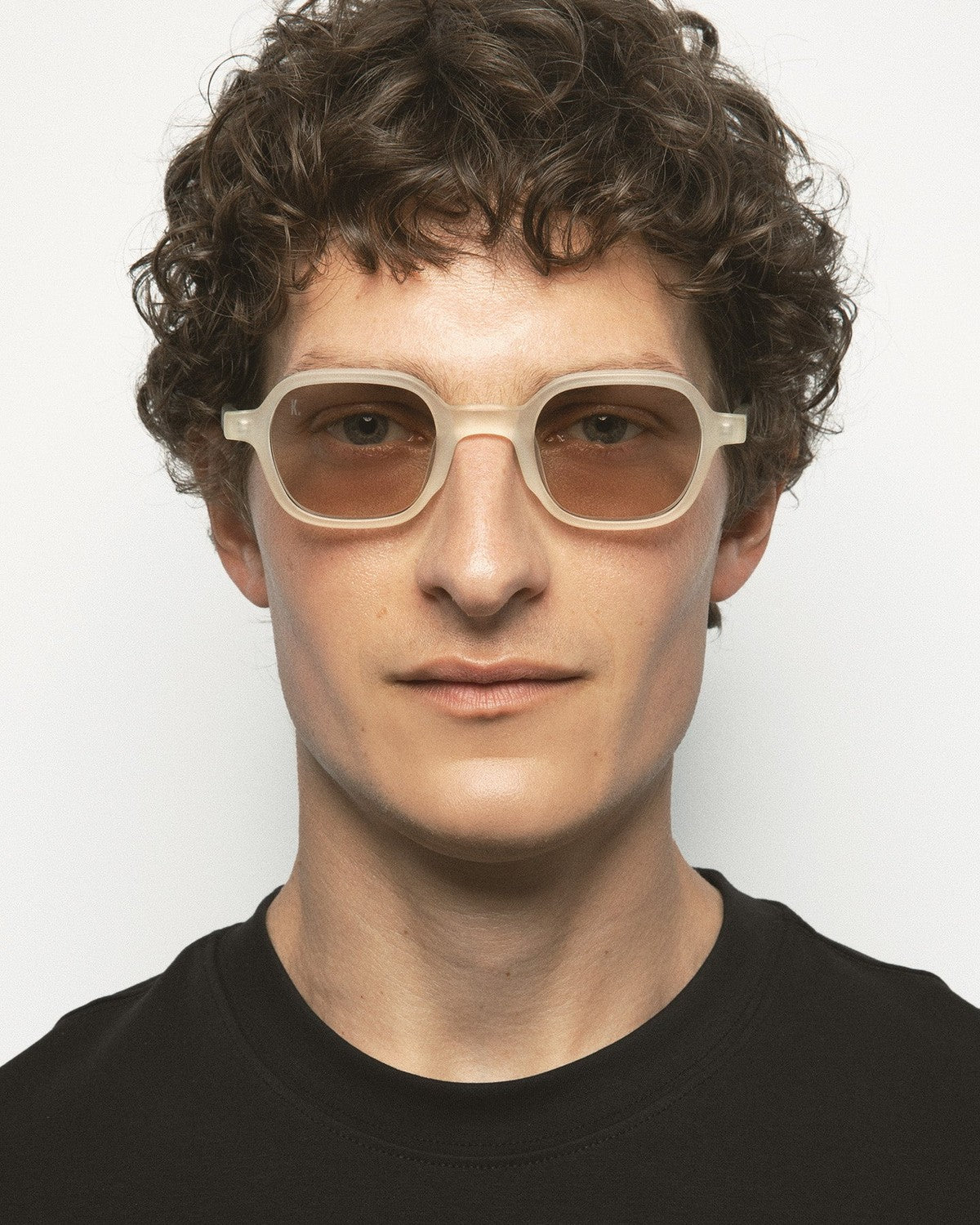 Model wearing KALEOS Castillo Crystal Yellow Matte Brown sunglasses.