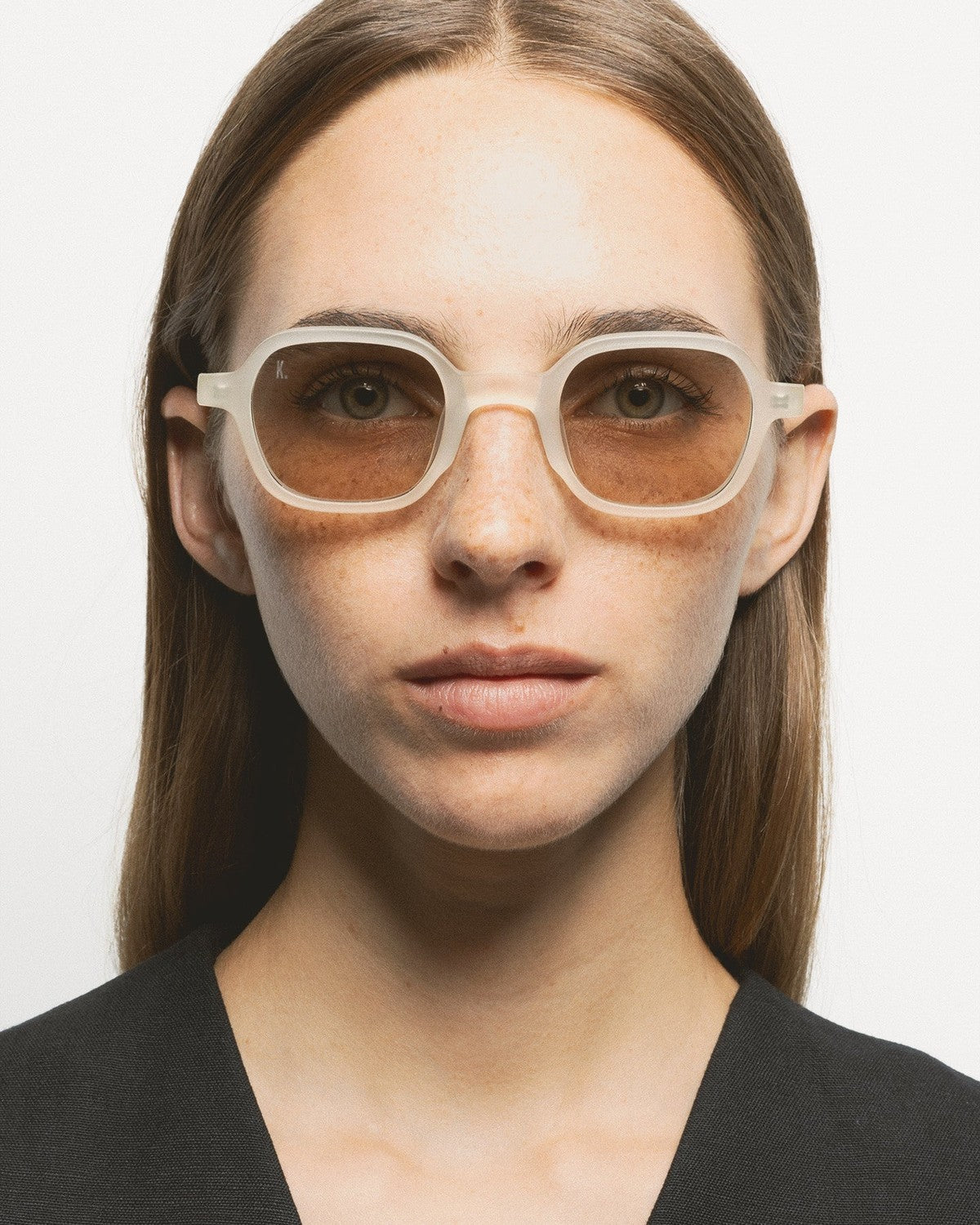 Front try-on view of KALEOS Castillo Crystal Yellow Matte Brown sunglasses.