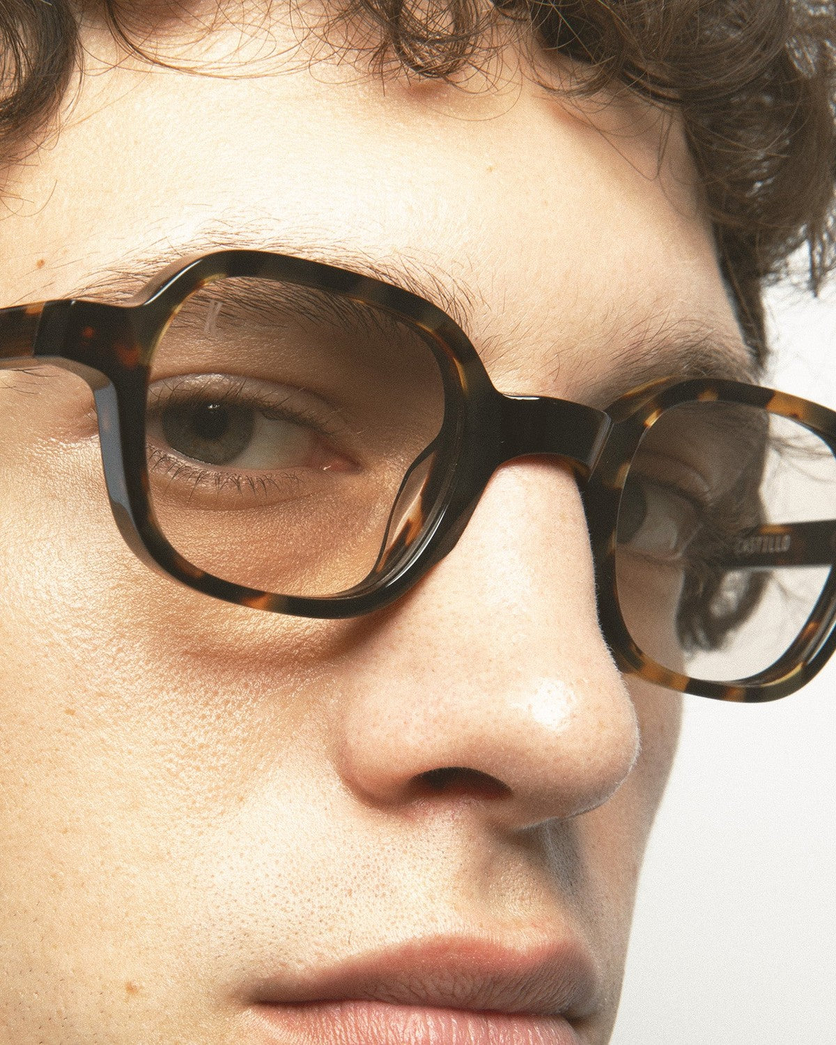 Close-up of the frame front and bridge detail on KALEOS Castillo Dark Havana Yellow sunglasses.