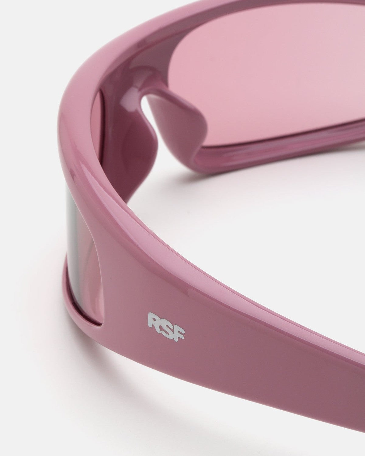 Close-up of the RSF logo on RETROSUPERFUTURE Cerchietto Caramella sunglasses.