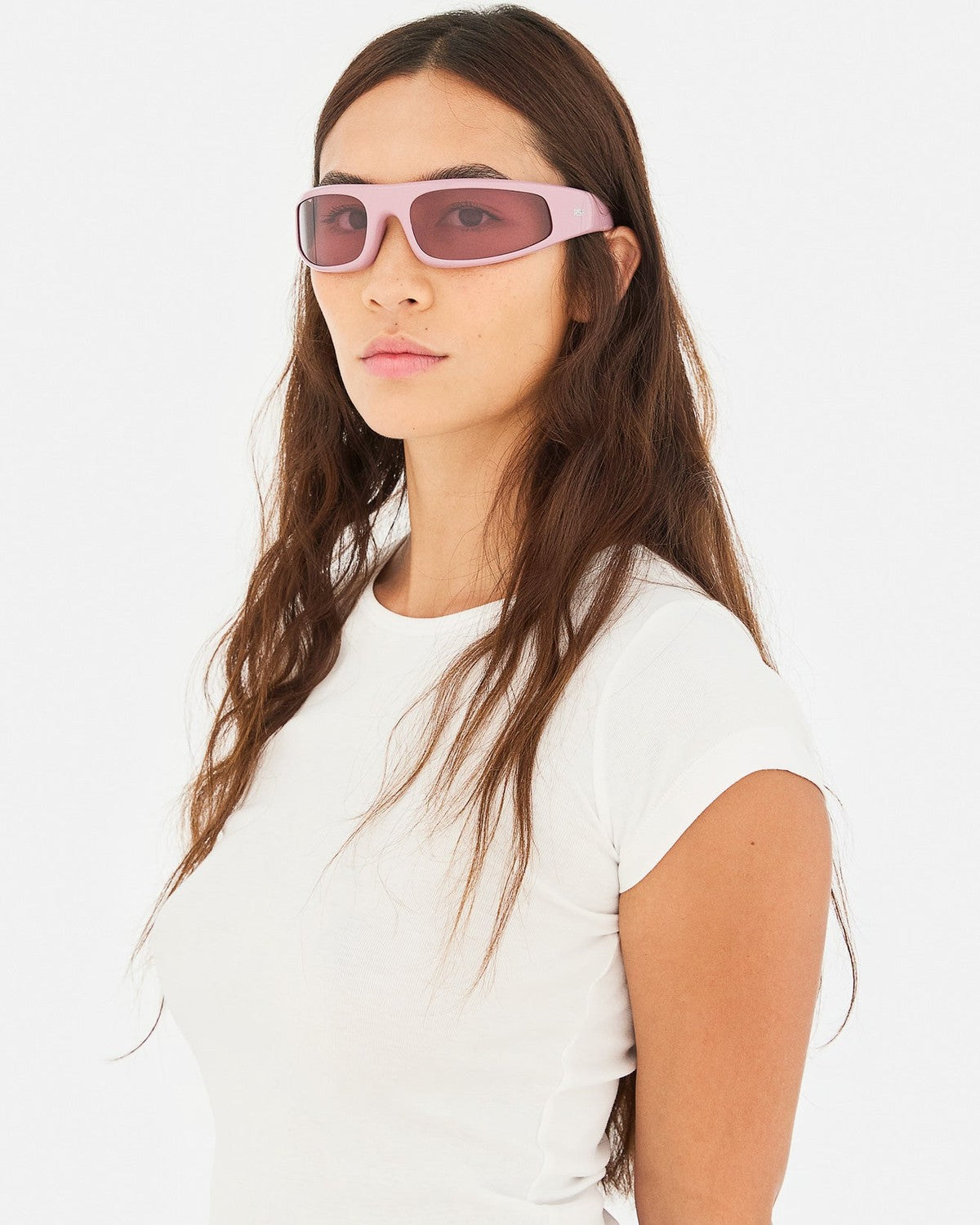 Model wearing RETROSUPERFUTURE Cerchietto Caramella sunglasses.