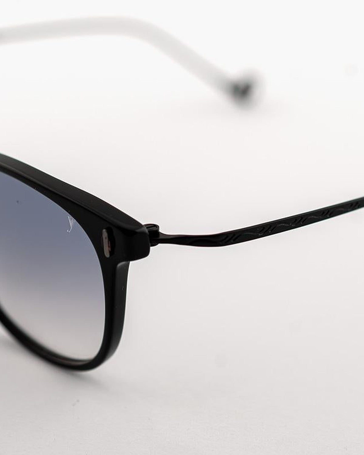 Close-up of the temple hinge detail on EYEPETIZER CHARLES C.A-6-27F sunglasses.