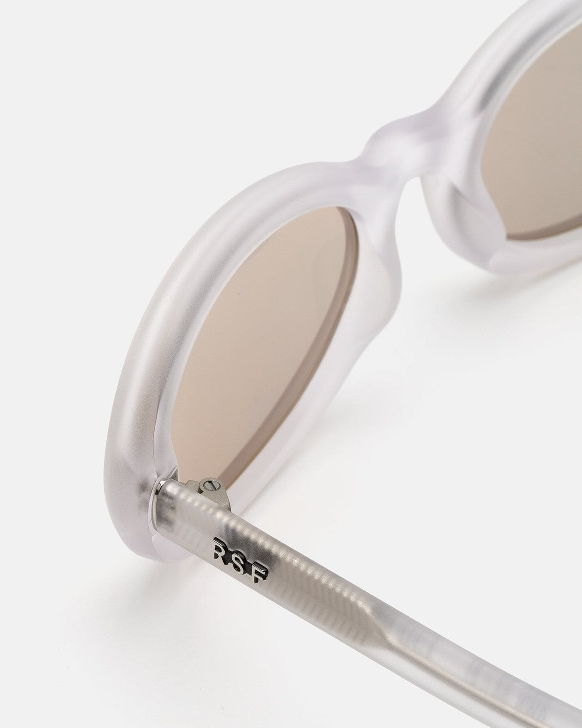 Close-up of the temple hinge on RETROSUPERFUTURE Cherry Frozen sunglasses.
