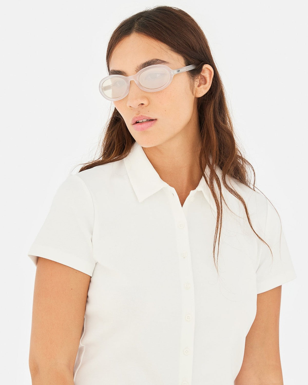 Model wearing RETROSUPERFUTURE Cherry Frozen sunglasses with white shirt.