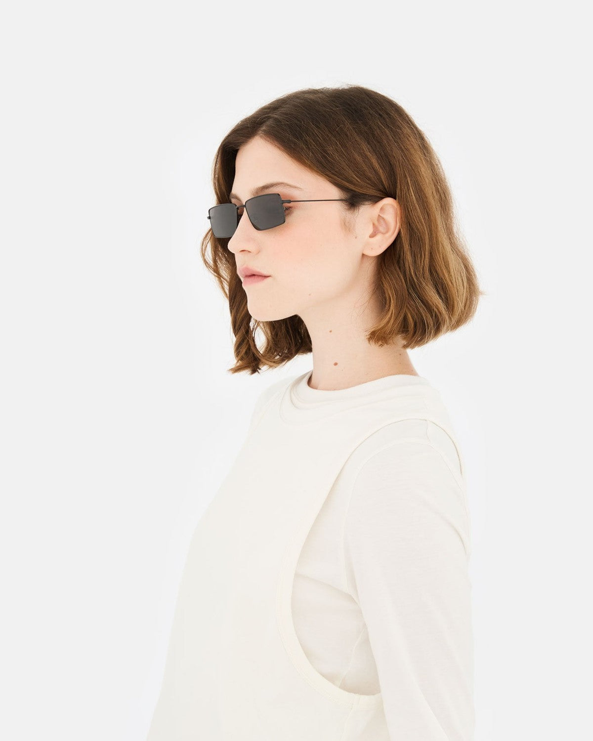 Side profile of model wearing RETROSUPERFUTURE Chopper Fiammato sunglasses.