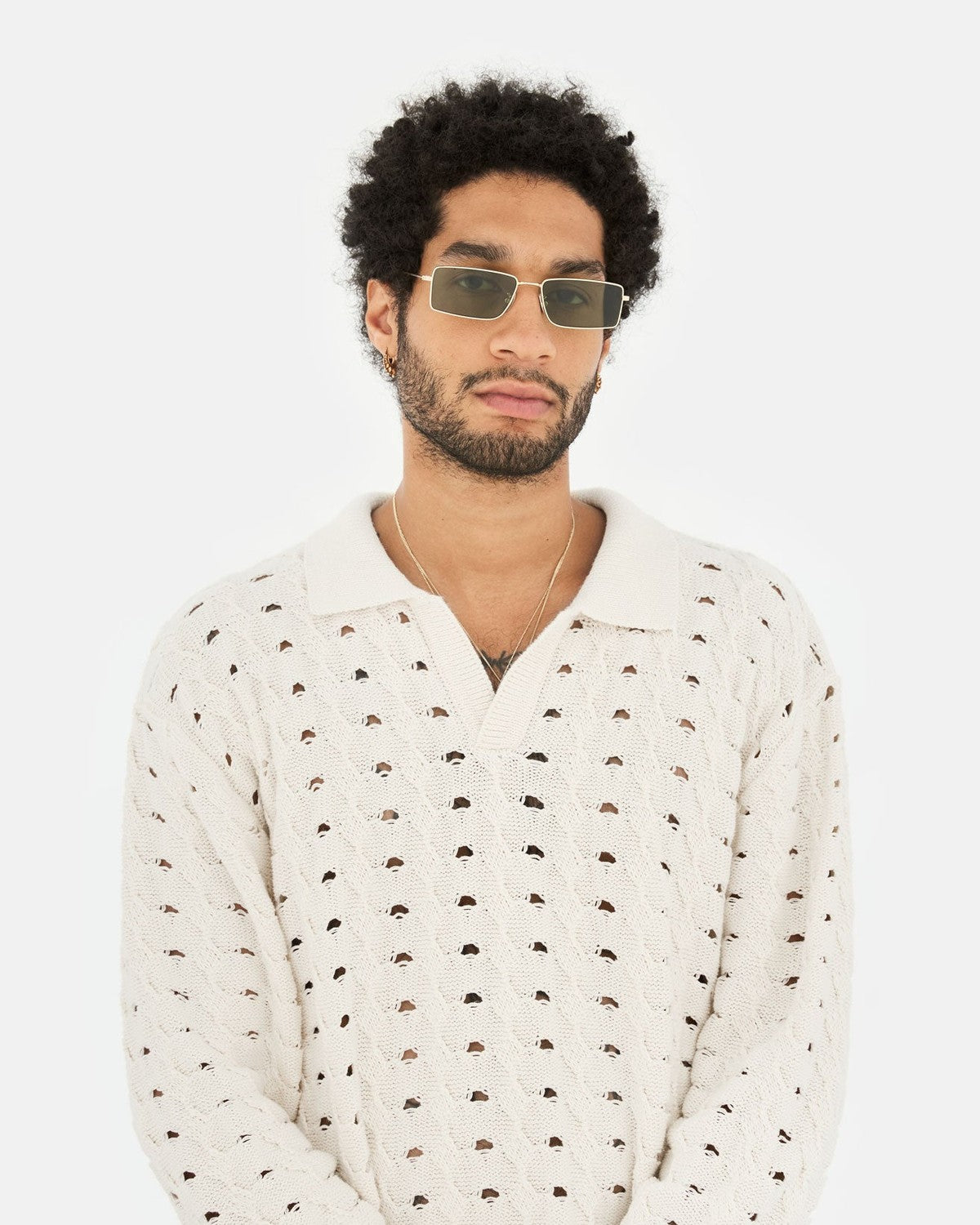 Model wearing RETROSUPERFUTURE Chopper Light Havana sunglasses.