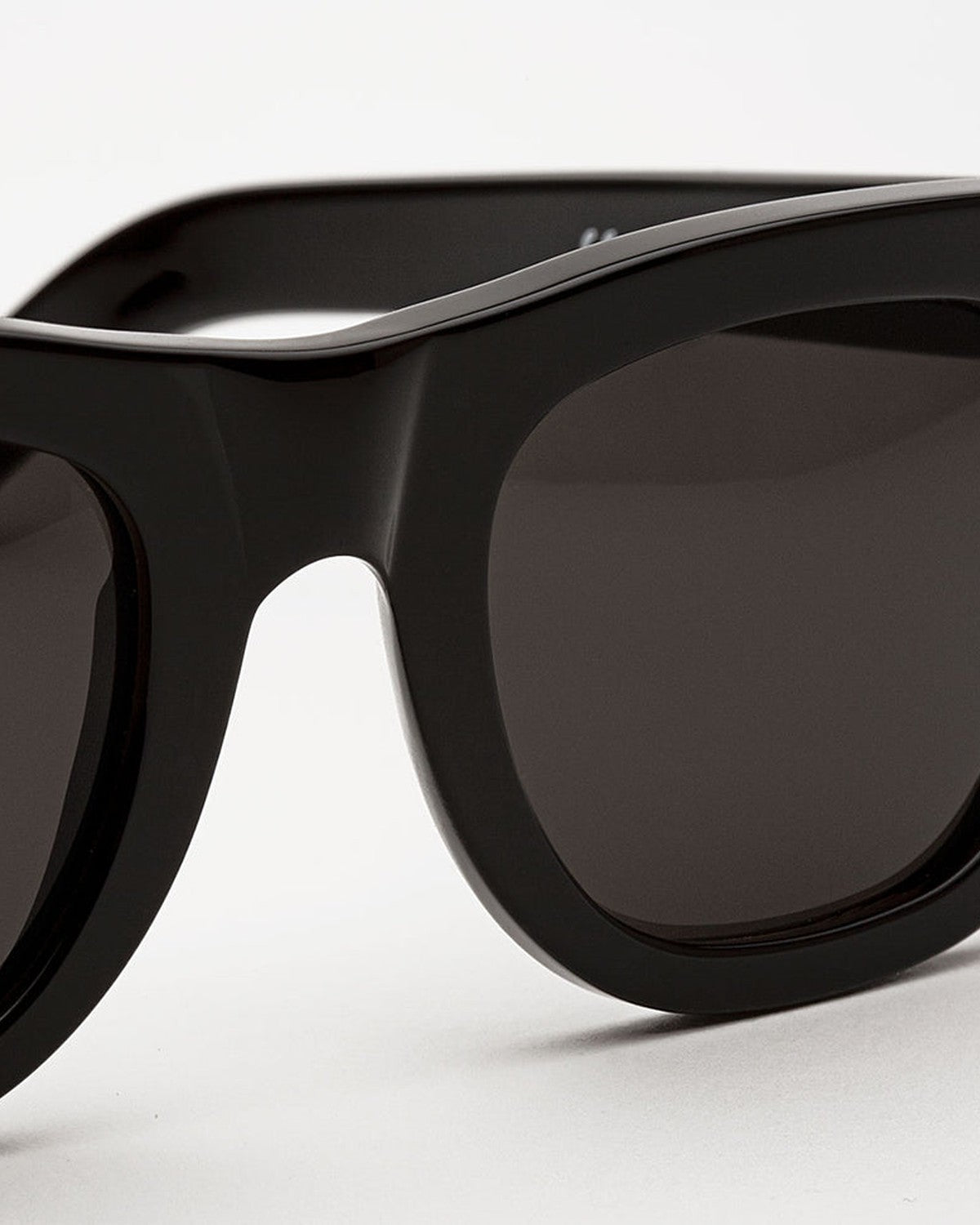 Close-up of the bridge and frame construction on RETROSUPERFUTURE Ciccio Black sunglasses.