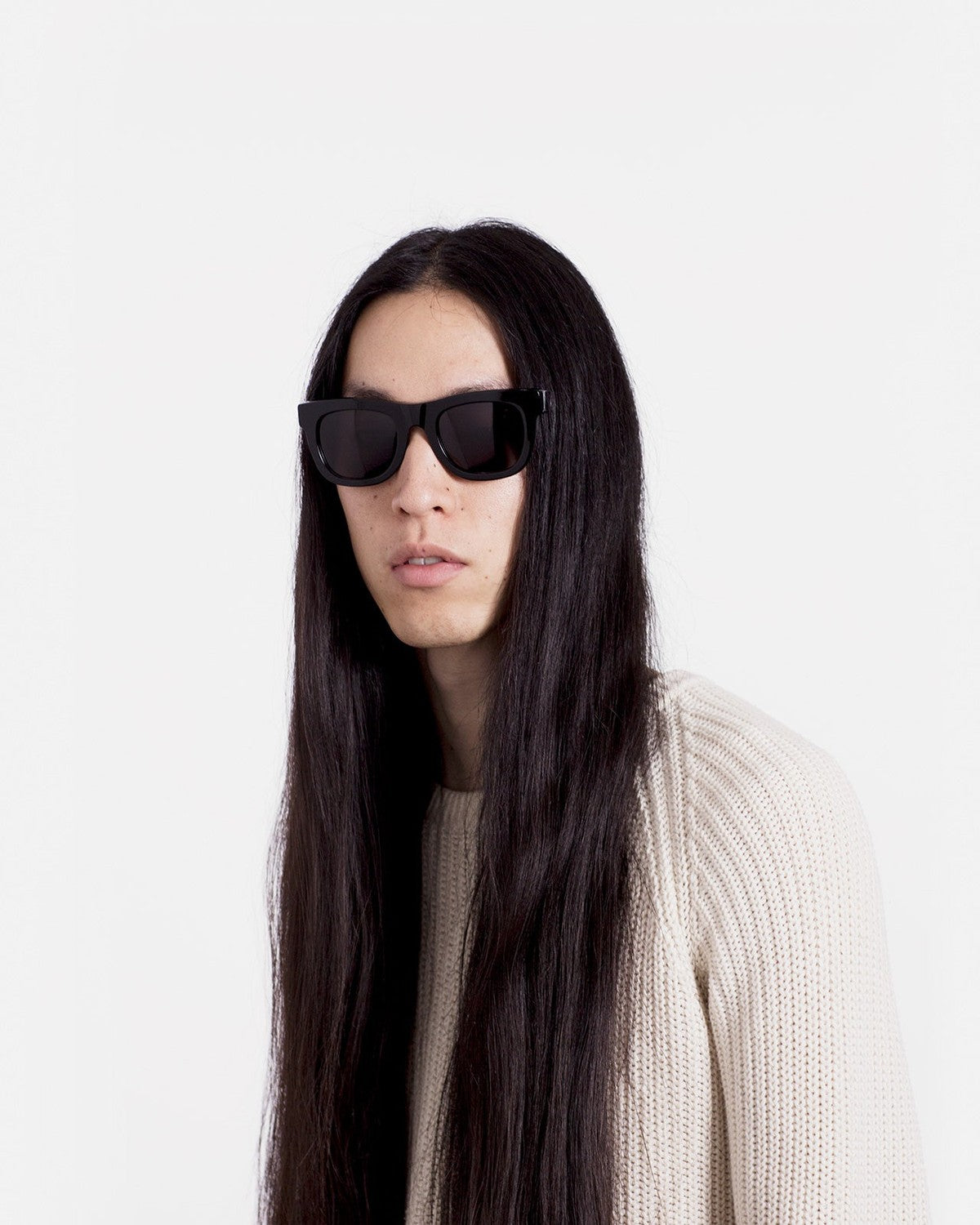 Model wearing RETROSUPERFUTURE Ciccio Black sunglasses.