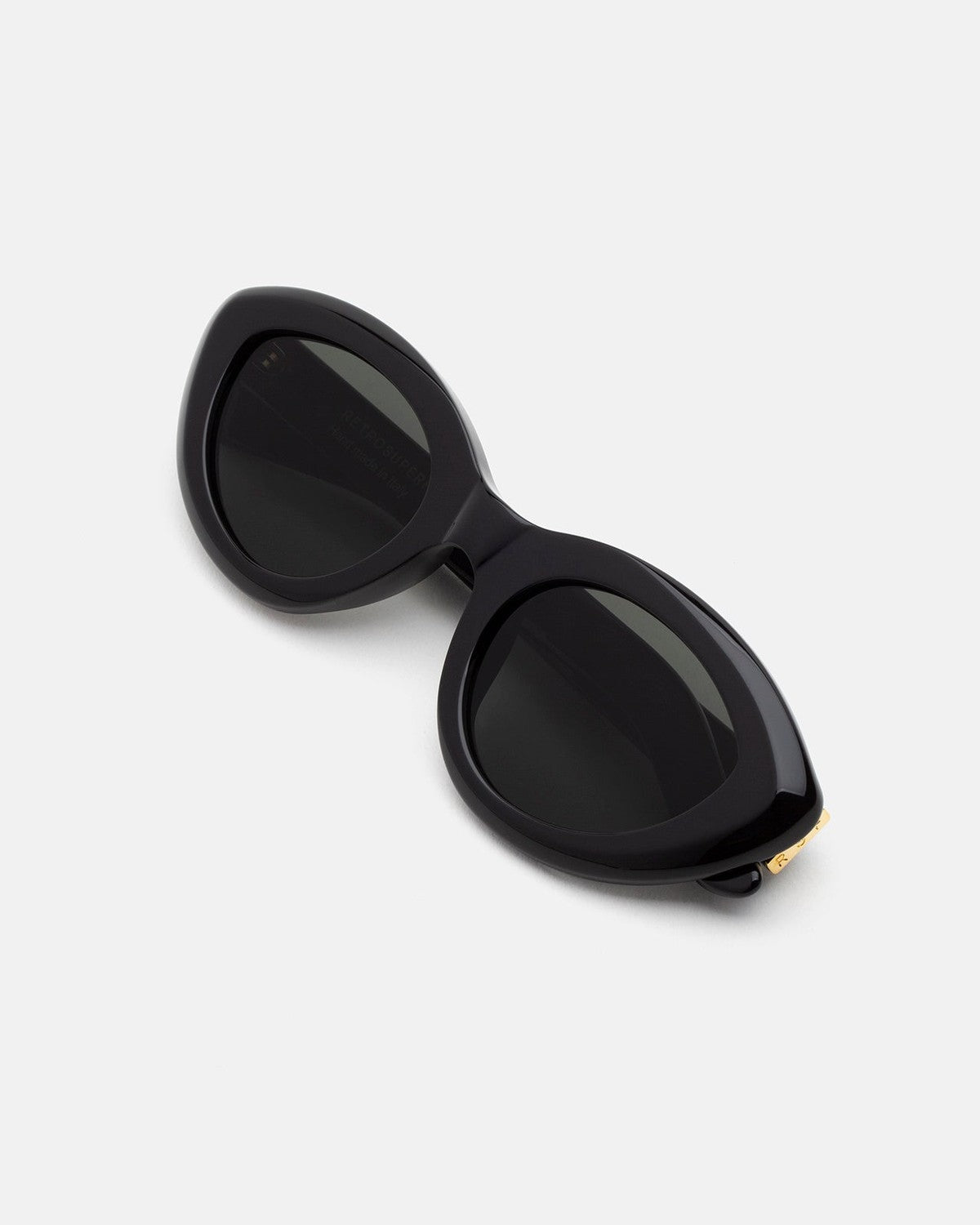 Folded view of RETROSUPERFUTURE Cocca Black sunglasses.