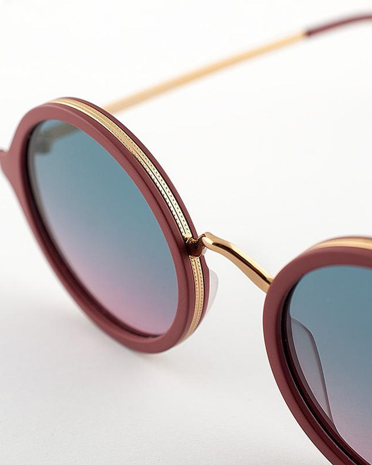 Close-up of the bridge and gold metal nose detail on EYEPETIZER DES ART C.O-4-20 sunglasses.