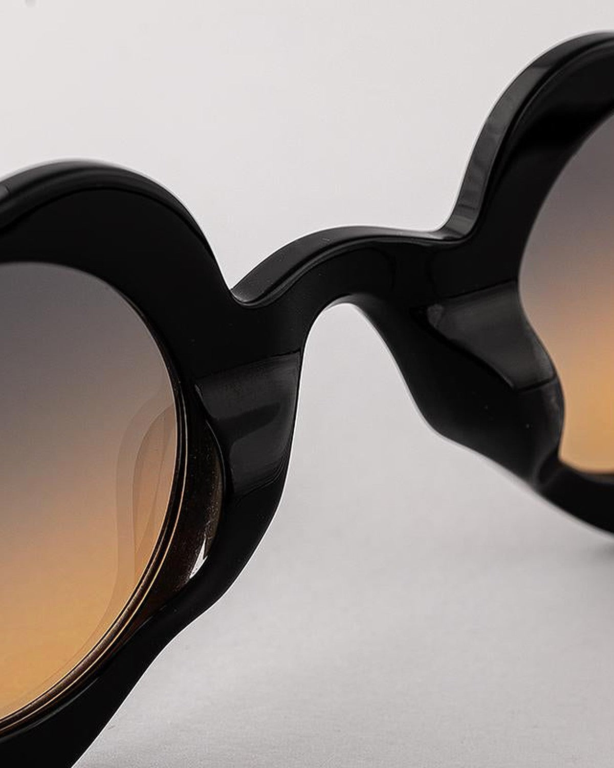 Close-up of the heart-shaped frame and bridge on EYEPETIZER DICIASSETTE C.A-41F sunglasses.