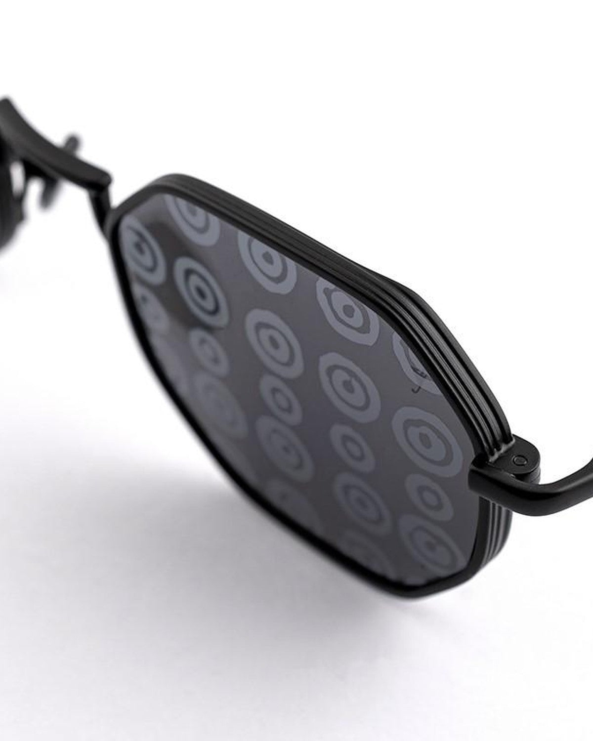 Close-up of the geometric lens and temple hinge on EYEPETIZER DIECI C.6-7L sunglasses.
