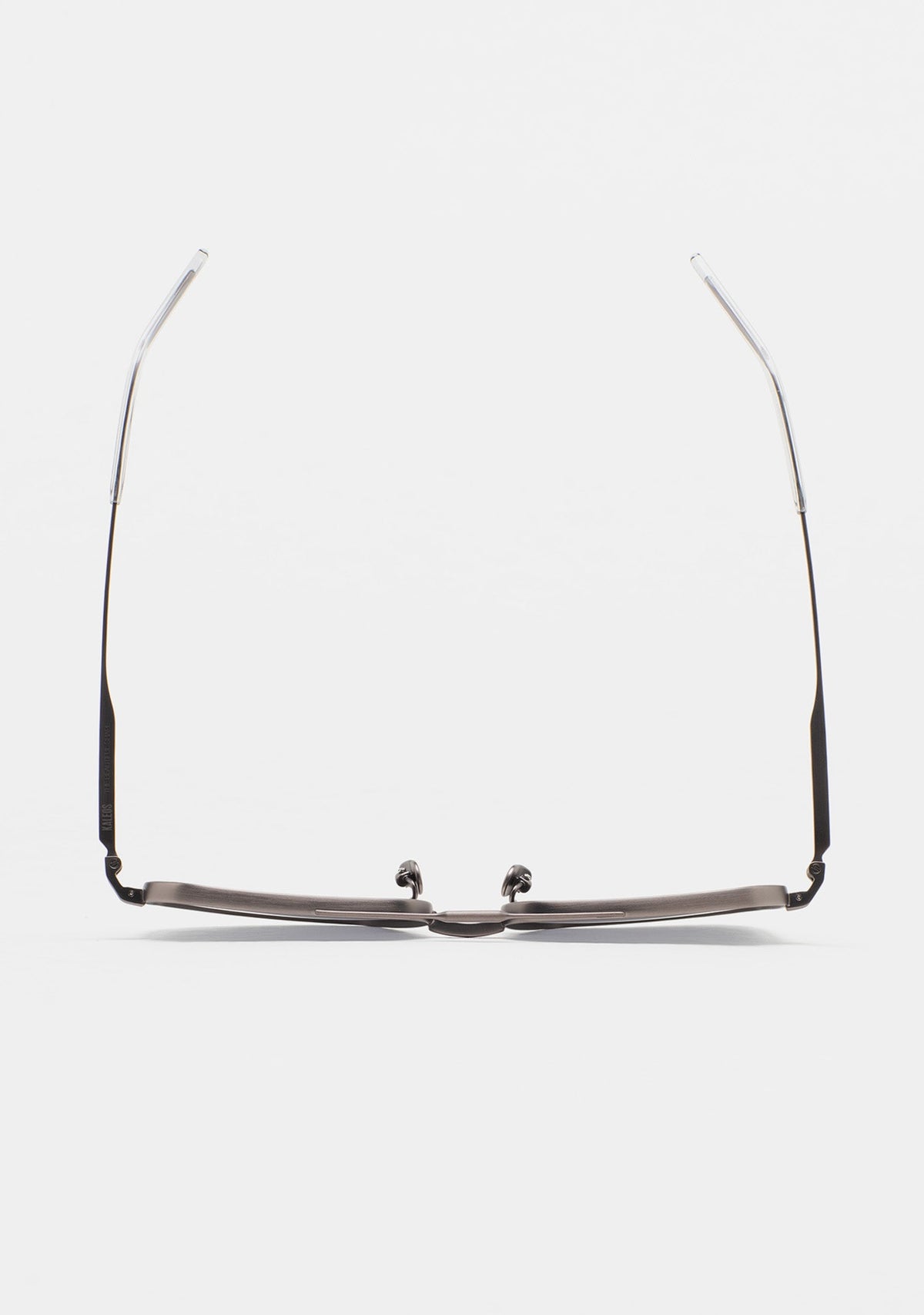 Top-down view of KALEOS DonnellyTitanium 01 sunglasses with temples folded.