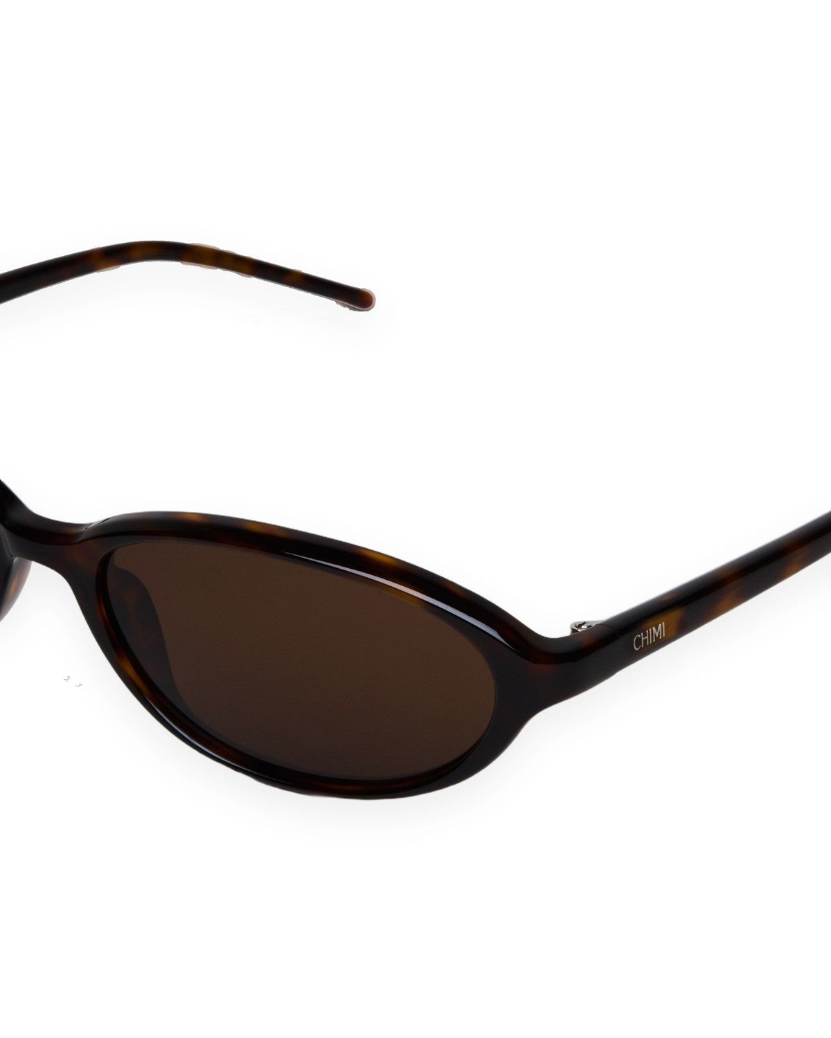 Detail of the temple and branding on CHIMI Ellipse Tortoise Brown sunglasses.
