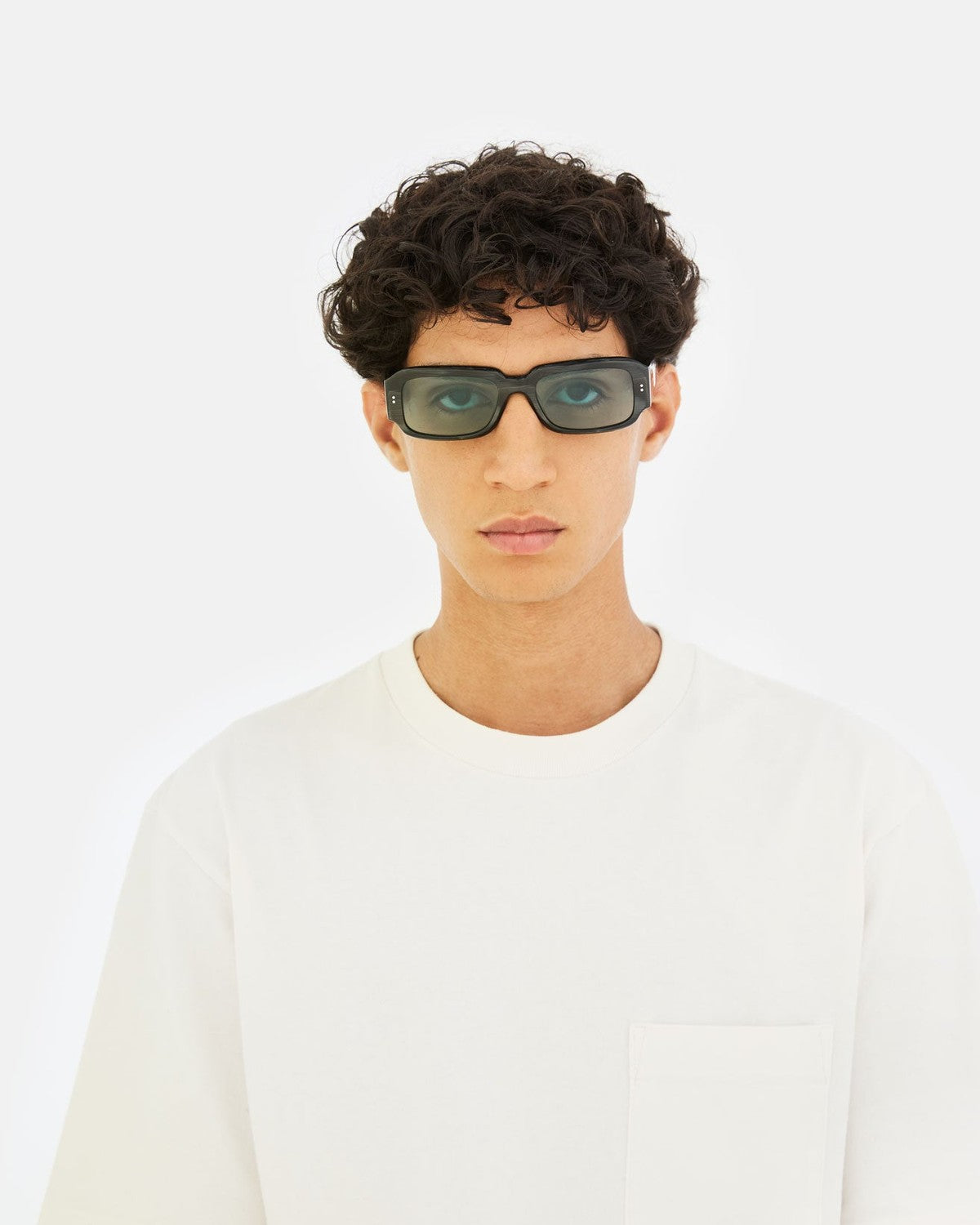 Model wearing RETROSUPERFUTURE Etrusco Fiammato sunglasses, front view.