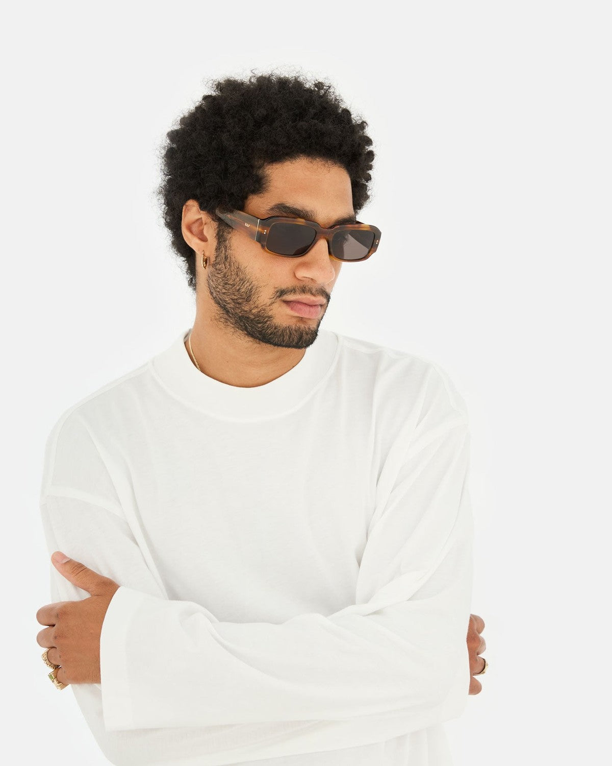 Model wearing RETROSUPERFUTURE Etrusco Tangeri sunglasses.