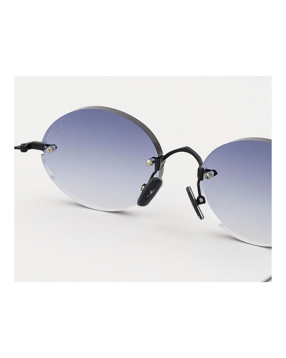 Detail of the nose bridge and decorative hardware on EYEPETIZER WILMOT C.6-51 sunglasses.