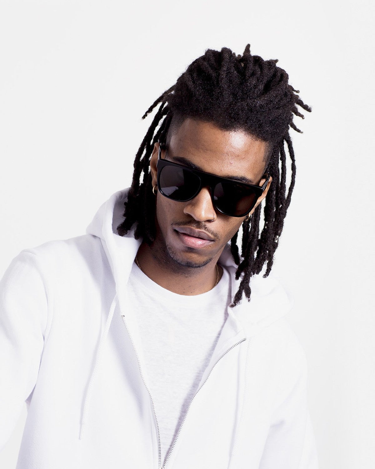 Model wearing RETROSUPERFUTURE Flat Top Black sunglasses.