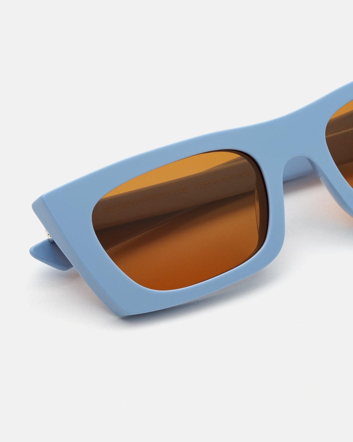 Close-up of the rectangular lens and frame construction on RETROSUPERFUTURE Fred 2.0 Coolcat sunglasses.